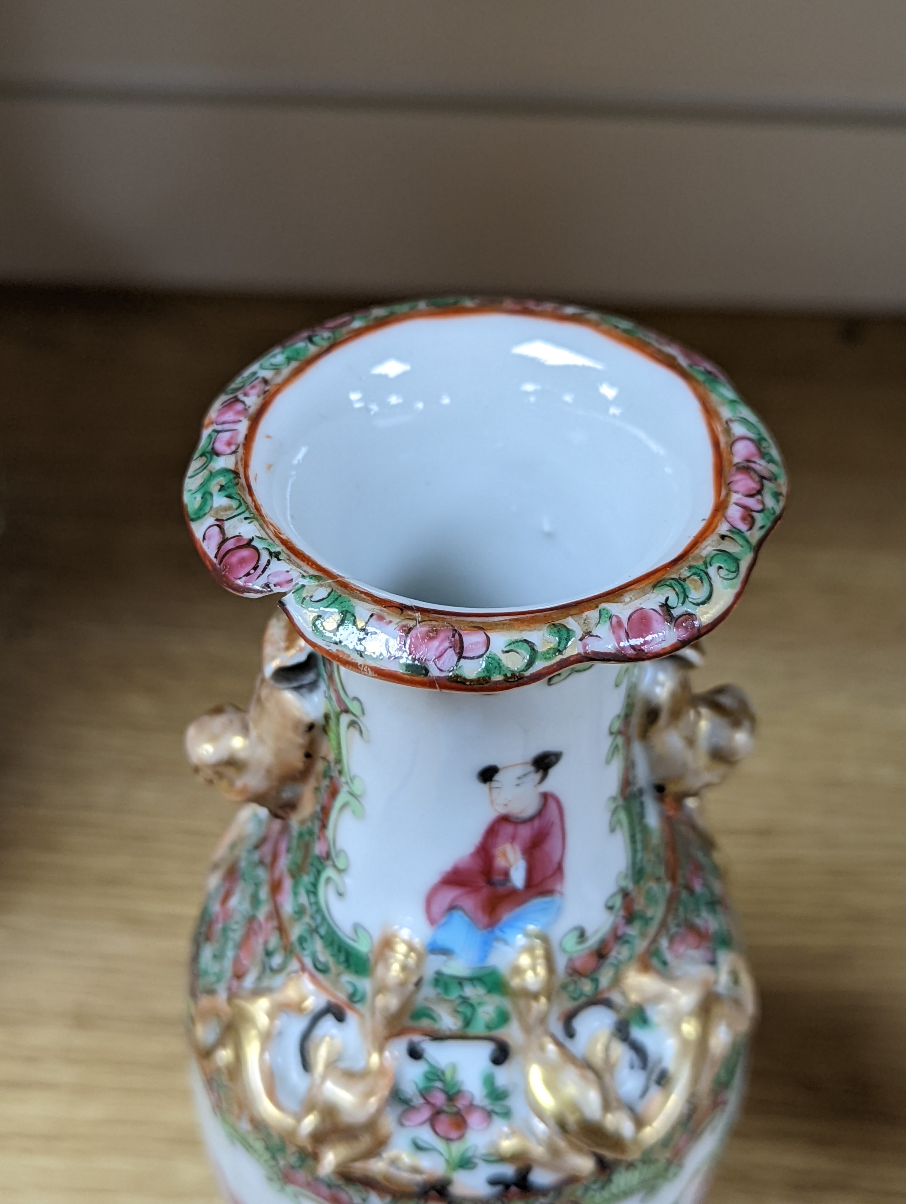 Four 19th century Chinese famille rose vases, 21cm